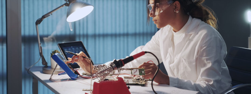 Technician using a Techni-Pro multimeter working on test and measurement